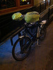 Why do delivery bikes have plastic bags on seats?